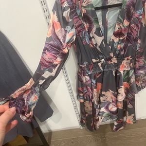 Silk dress with beautiful colors, wore just once for about two hrs. Almost new